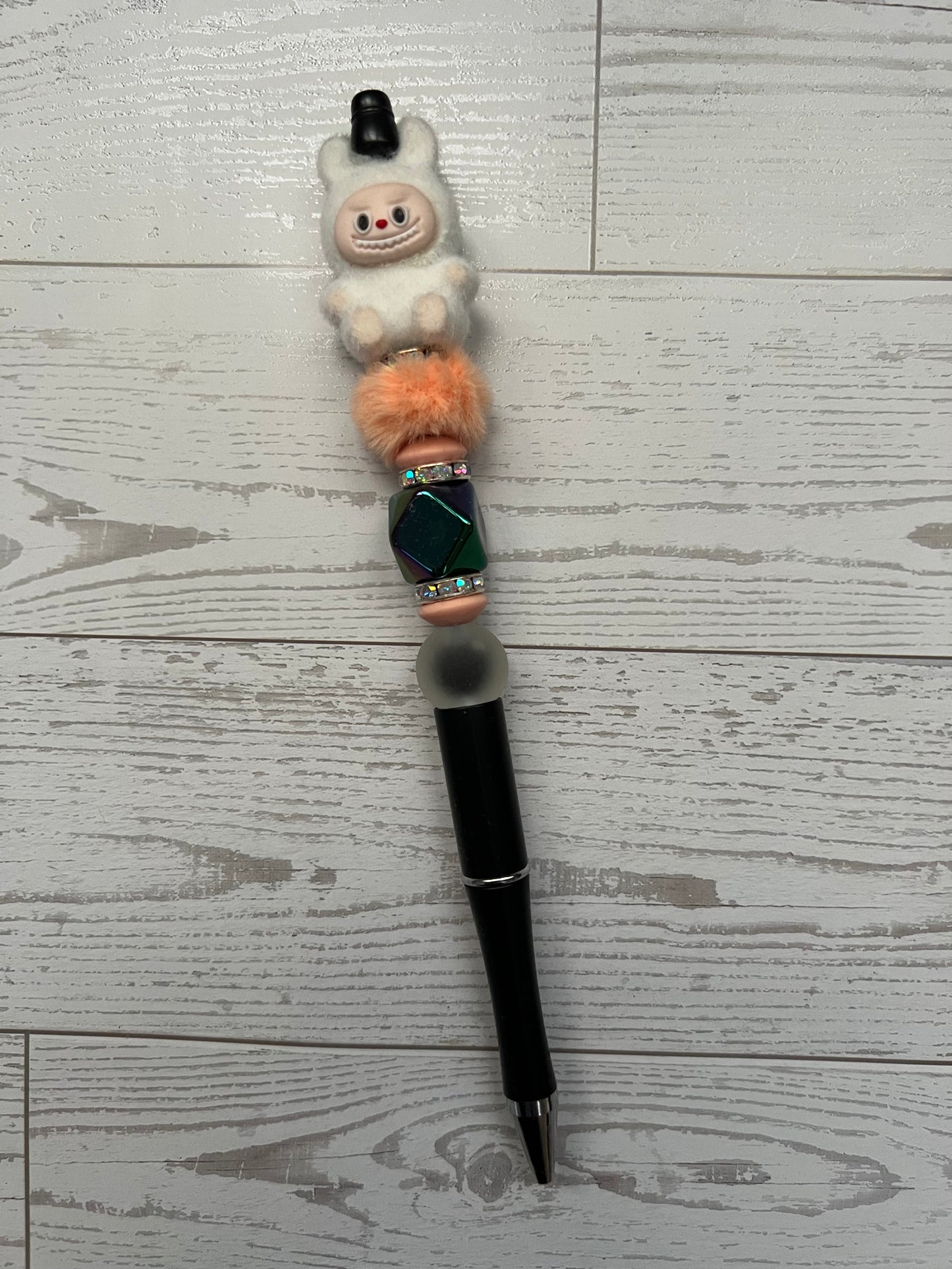 Bubu Sitting Beaded Pens on Extender