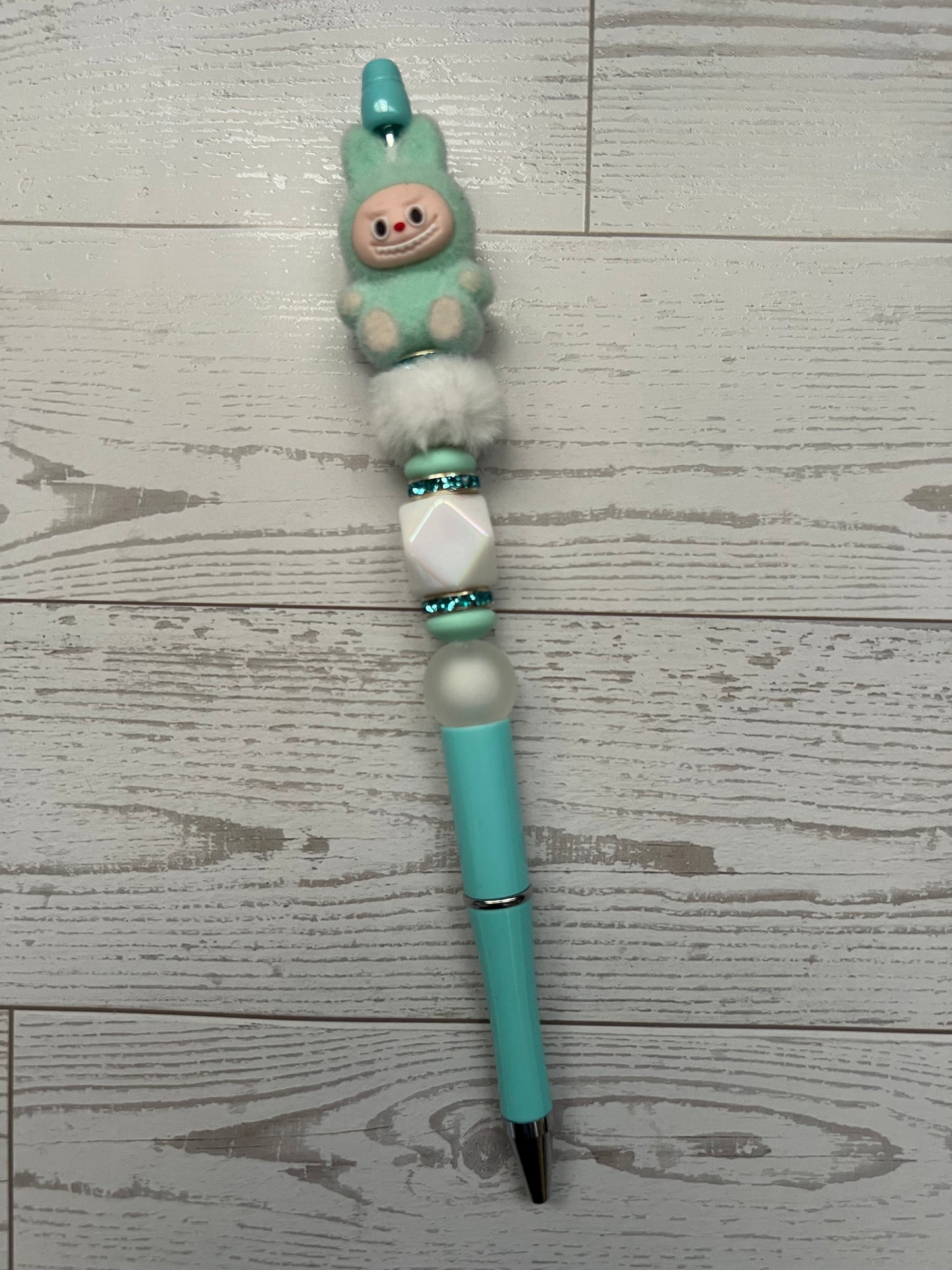 Bubu Sitting Beaded Pens on Extender